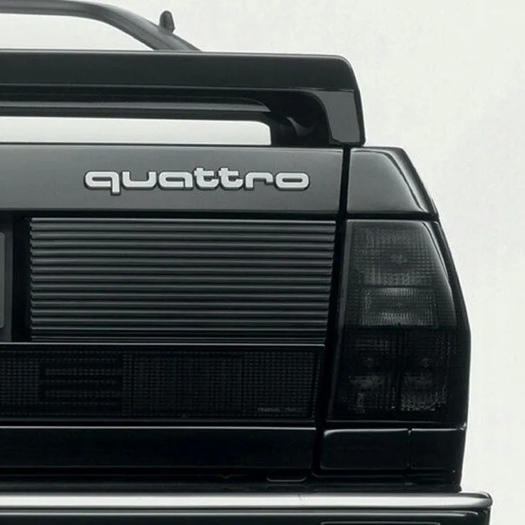 The rear of a black Audi quattro